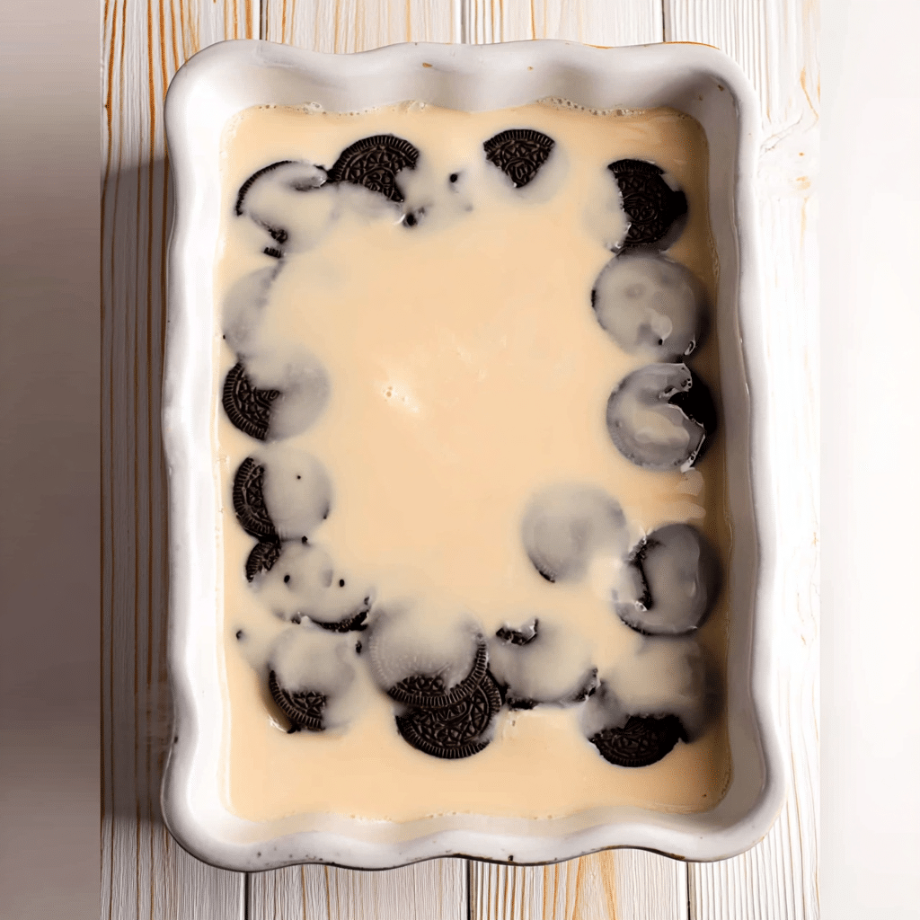 Oreo Dump Cake: Insanely Easy, Fudgy Recipe You’ll Love Forever 8 Layering Oreos and condensed milk in a baking dish