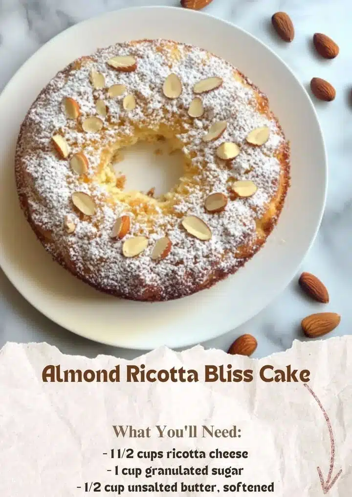 Delicious Ricotta Cake topped with Almond Glaze on a rustic table