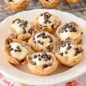 Delicious mini cannoli cups filled with creamy ricotta, perfect dessert treat.
