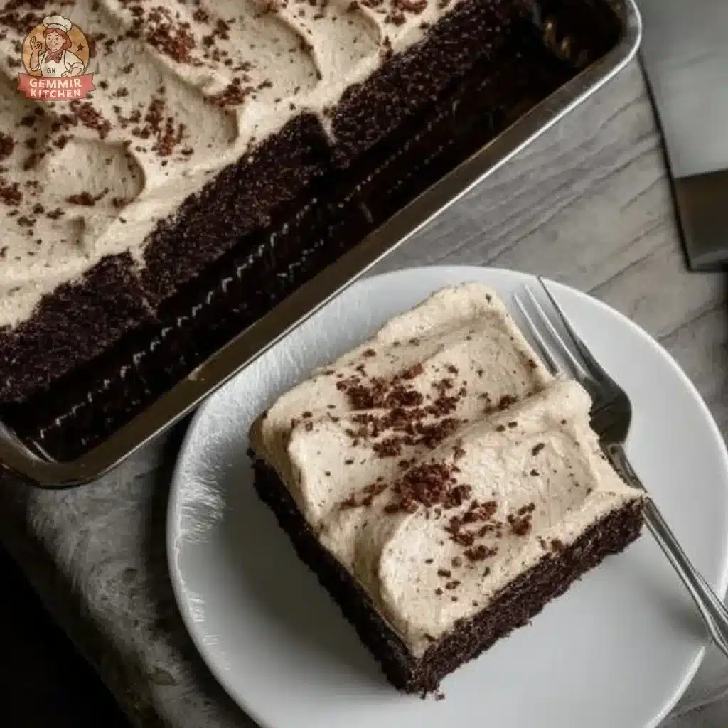Delicious chocolate espresso cake topped with creamy frosting and coffee beans