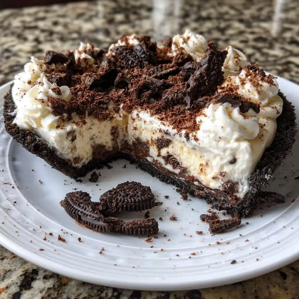 No-bake chocolate mascarpone pie topped with chocolate shavings and whipped cream