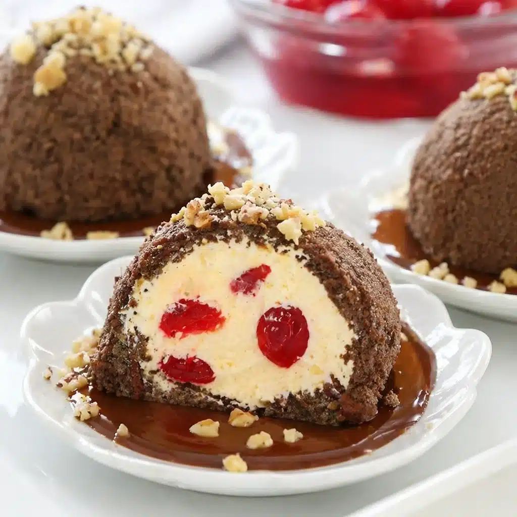 Creamy Cherry Hazelnut Dessert Cups topped with cherry compote and hazelnut crumble.