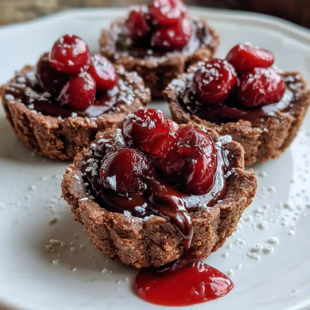 Delicious Chocolate Cherry Tartlets topped with mascarpone cream