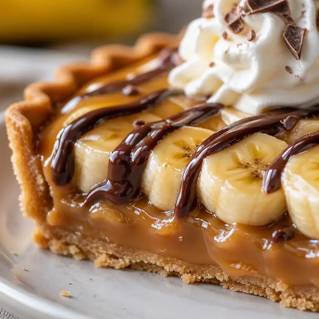 A delicious Banana Caramel Tart with gooey filling and a buttery crust, perfect for picnics.
