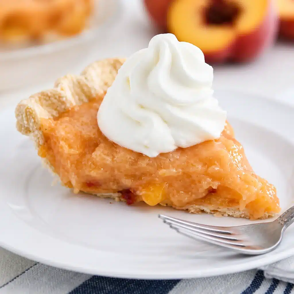 Deliciously Easy Homemade Peach No Bake Pie: A Vintage Delight 4 Homemade Peach No Bake Pie with fresh peaches and creamy filling in a graham cracker crust