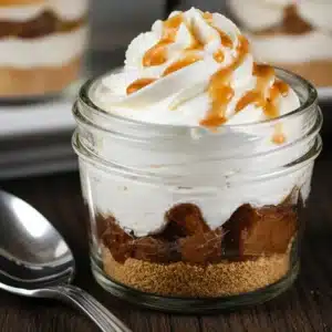 Delicious No-Bake Apple Cheesecake Jars with spiced apples and creamy filling.