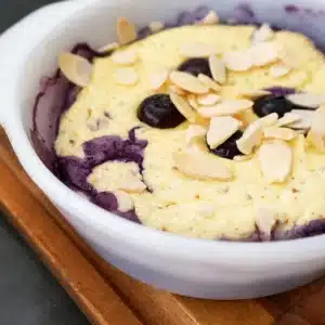 Almond Ricotta Breakfast Bake topped with sliced almonds, ready to serve.