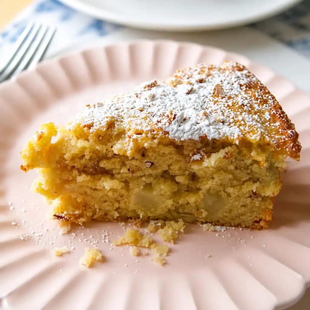Deliciously Moist Apple Almond Coffee Cake for Any Occasion 6 Slice of Apple Almond Coffee Cake on a plate with almonds and fresh apples.